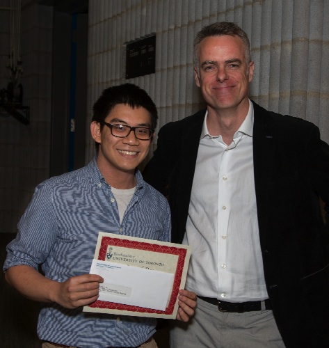 Brandon Sit receives an award for highest achievement in our BCH377 lab course